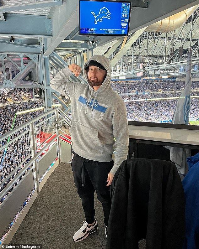 Lions fan: The hip hop icon flexed his muscles while sitting in a stadium suit during the Lions' win over the Tampa Bay Buccaneers on Sunday, October 15: “Detroit strong!!!  let's f***mo gooooo!!!!'