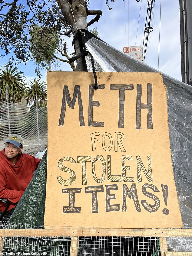 Photos show his encampment decorated with signs that read 