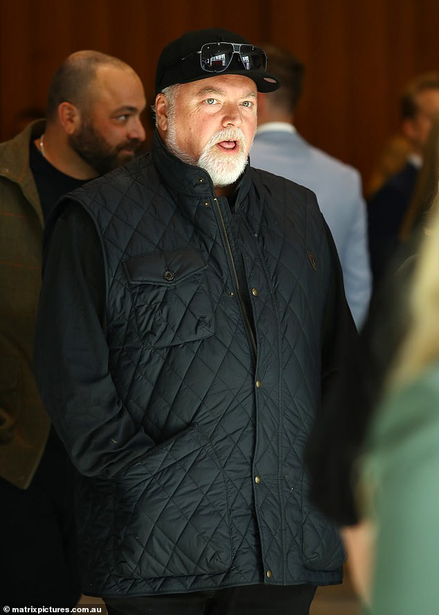 Kyle completed his look with his trademark white beard and flashed a cheeky smile as he posed for photos on the red carpet