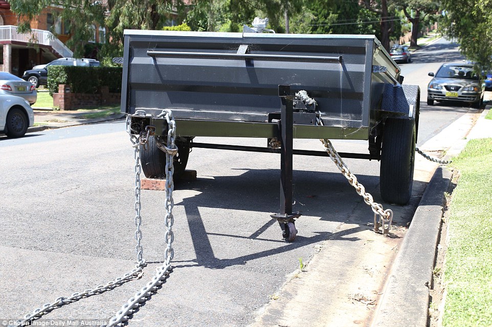 They are then secured with two heavy steel chains, each bolted into thick rings that are somehow embedded into the concrete channel