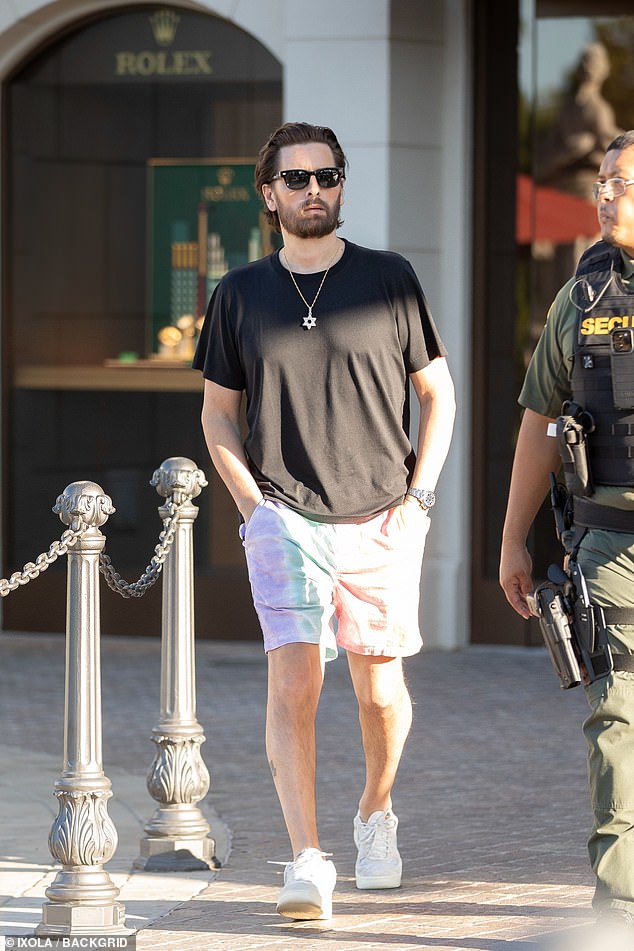 Style: The Kardashian favorite looked cool, calm and collected as he strolled down the path with his hands in his pockets and a statement watch adorning his wrist