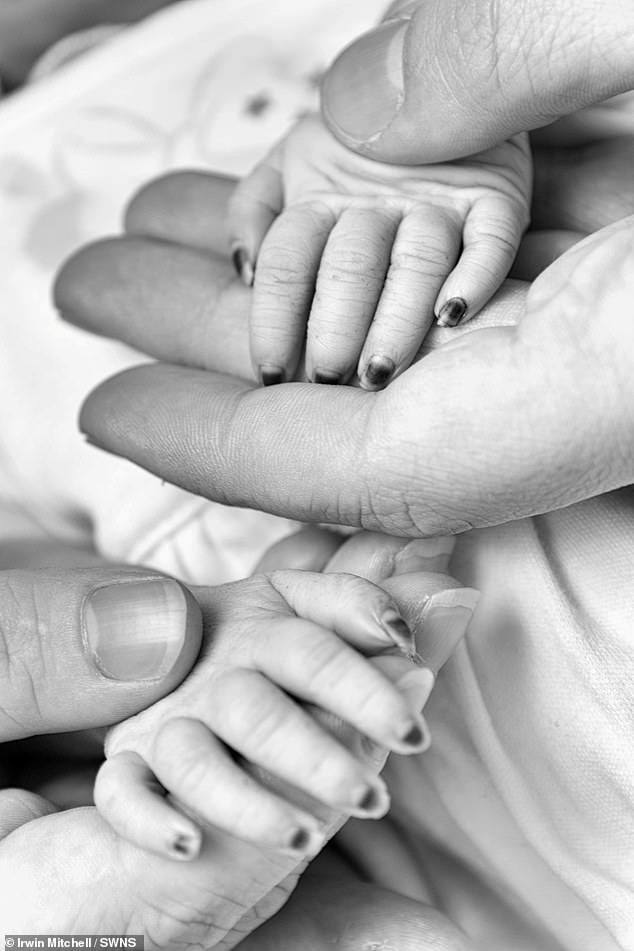 Staff were unable to find a heartbeat and Mrs Walters was told Heidi had died.  Pictured is a photo of her hands