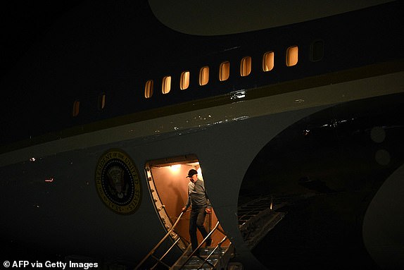 US President Joe Biden steps off Air Force One upon arrival at Andrews Air Force Base in Maryland early October 19, 2023. Egyptian President Abdel Fattah al-Sisi has agreed to open the Rafah border crossing into Gaza to allow a first batch of about 20 humanitarian aid trucks are passing by, US President Joe Biden said on October 18, 2023. (Photo by Brendan SMIALOWSKI/AFP) (Photo by BRENDAN SMIALOWSKI/AFP via Getty Images)