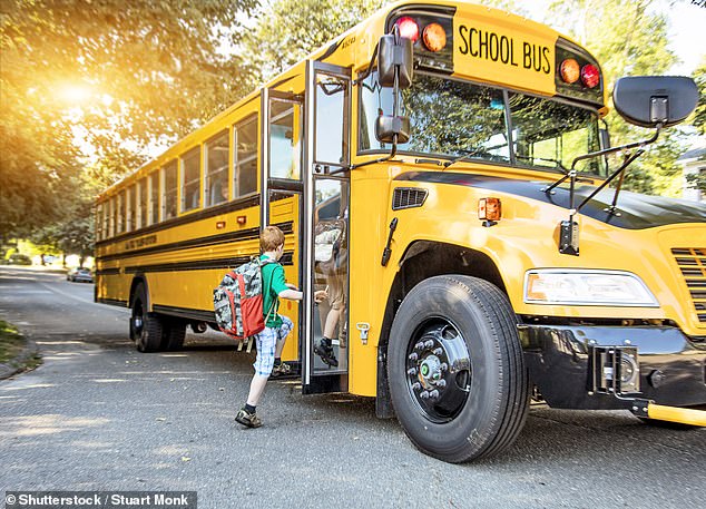 The boys were among eight students who made the short bus trip from school to the zoo on Friday under the supervision of three teachers and a volunteer parent (pictured).