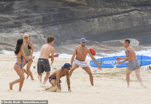 Doing well: Rookie Hugo Mackenzie Wood (third left) was also seen enjoying the day with the others