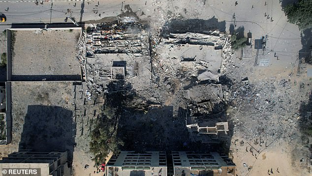 Residential buildings destroyed during Israeli attacks are seen in Zahra City on Thursday