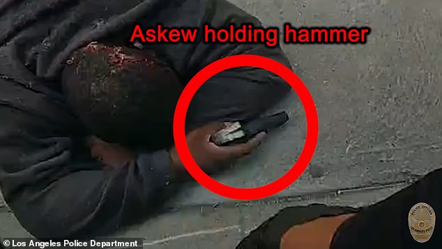 Police shot Askew (pictured) after he reached for his waistband for what they initially thought was a gun, but turned out to be a hammer