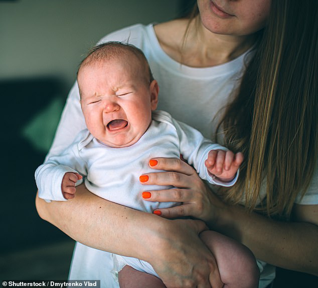 She took to Reddit to ask if she was the 'jerk' for wanting to move into a hotel with her three-week-old daughter to get some space (stock image)