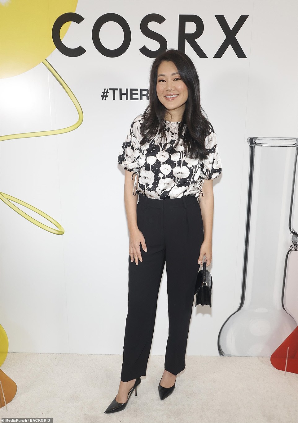 Baby!  The COSRKS event was also attended by Real Housewives of Beverly Hills star Krystal Kung Minkoff - who looked beautiful in a black and white floral top, black pleated trousers and matching sparkly pumps chosen by stylist Andrea Lublin