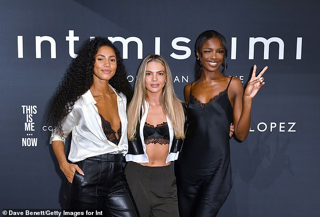 Three's company: Vic was joined by X Factor star Louisa Johnson (centre) and model Leomie Anderson as the trio posed up a storm for the cameras