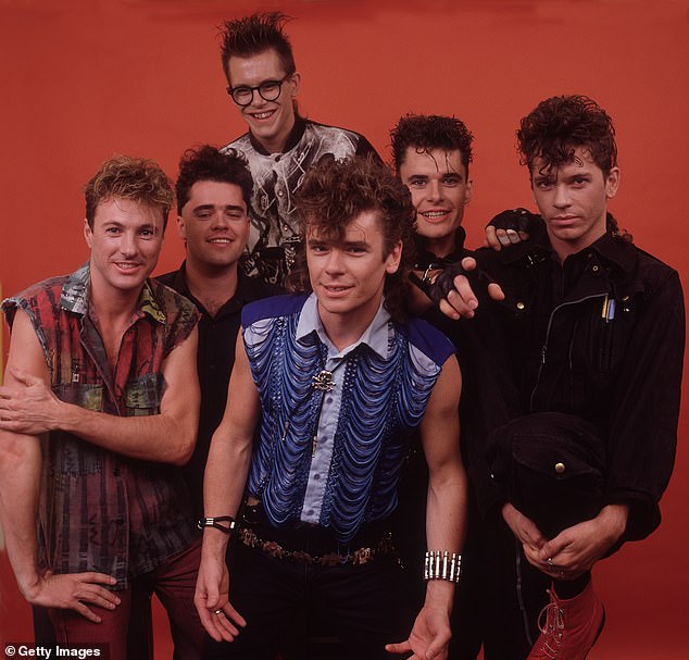 Get lost!  The group, consisting of Tim Farriss, Kirk Pengilly, Garry Gary Beers, Andrew Farriss and Jon Farriss, was managed by Michael Hutchence until his death in 1997.