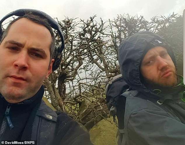 David Moss (left), 34, and Tom Taylor, 35 (right), found an impressive quantity of silver coins and copper alloys dating back to the 2nd and 3rd centuries AD in a ceramic vessel in a muddy field.