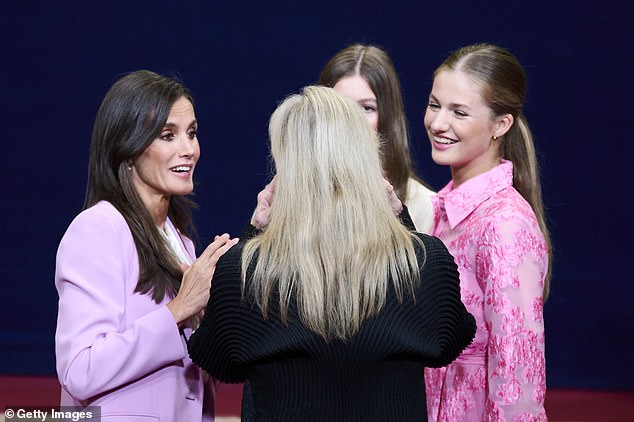 The Spanish queen, 51, wore an elegant pink power suit for the occasion, worn with a breezy white blouse.