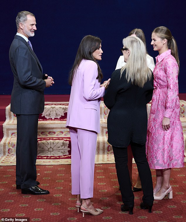 The Spanish couple's daughter, Leonor, appeared to take a leaf out of her mother's book as she too donned a pink ensemble in a pink dress