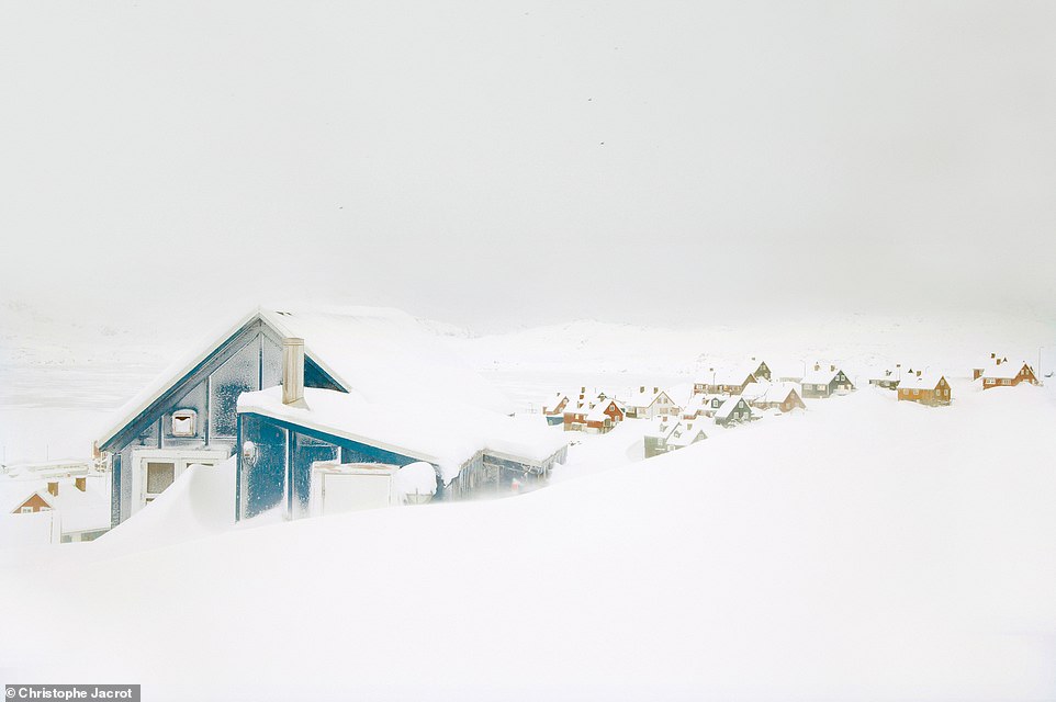 This retro blue house, buried in snow, was captured in the town of Tasiilaq in eastern Greenland