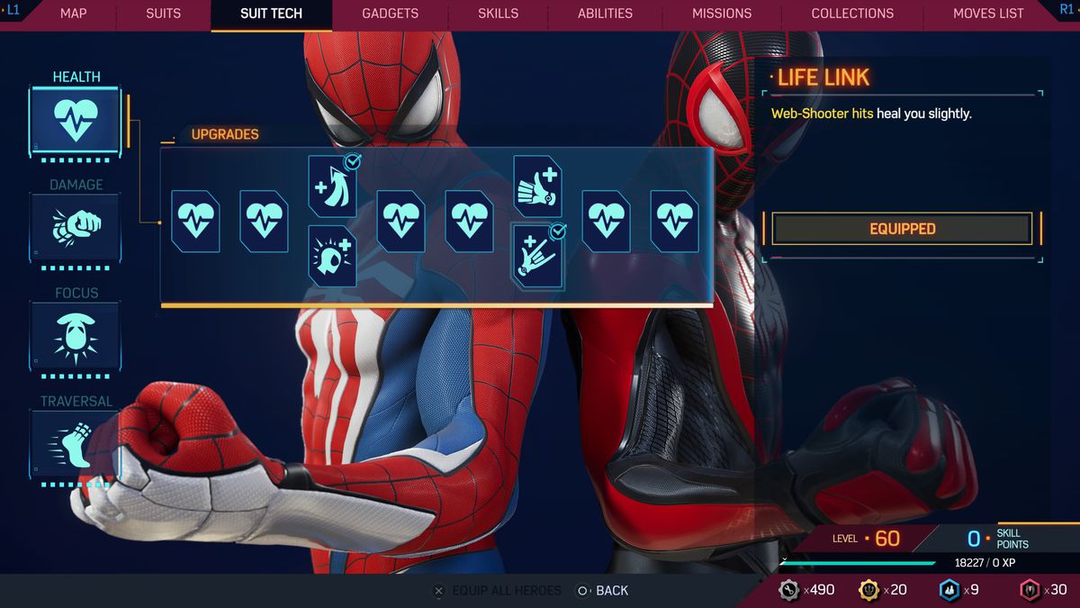 Miles and Peter hold their fists in Suit Tech - Health Menu