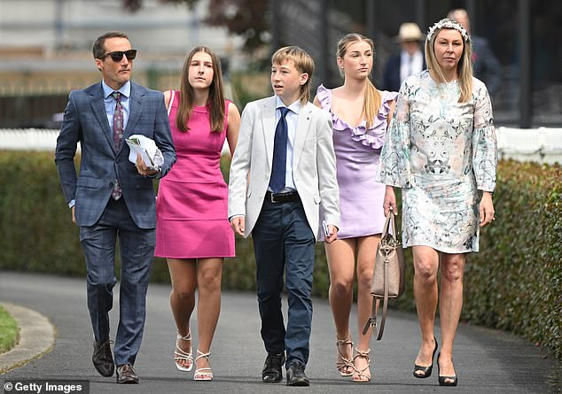 Champion jockey Damien Oliver races his final Spring Carnival after recently announcing his retirement in December (pictured left, with his family)