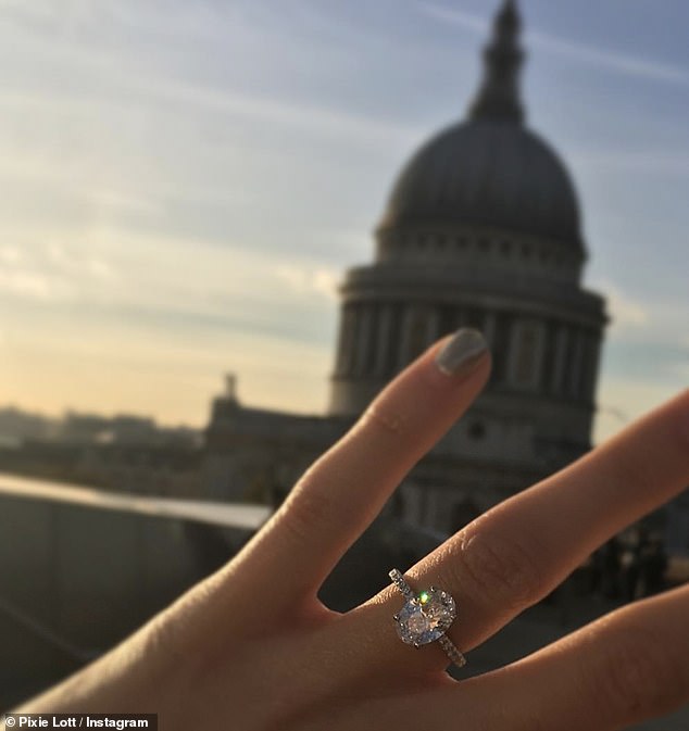 Sparkler: Pixie took to Instagram to announce their engagement and shared snaps of the special moment and her sparkly ring after Oliver proposed on the steps of St Paul's Cathedral