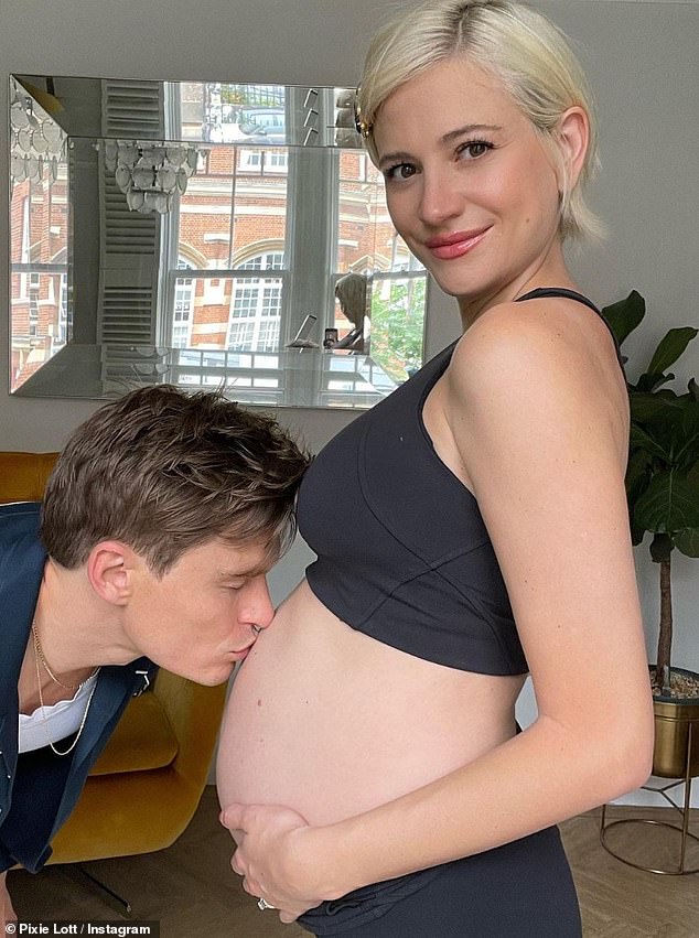 Adorable: In a series of sweet snaps, Pixie showed off her blooming baby bump in a black sports bra and leggings as Oliver kissed her belly