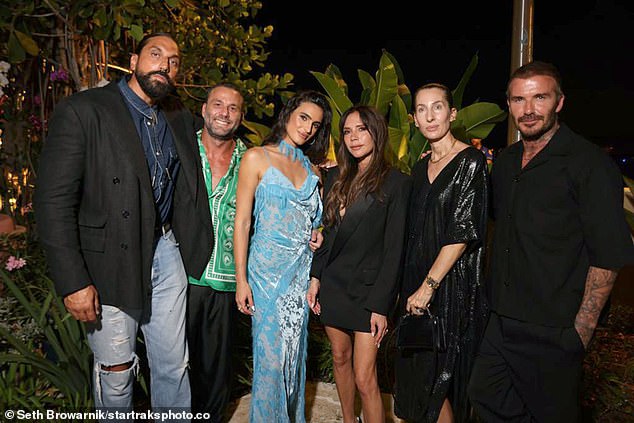 Launch: David also opted for an all-black ensemble, teaming an oversized shirt with some smart trousers (LR Ben Gorham, David, Isabela, Victoria, Natasha Gorham and David)