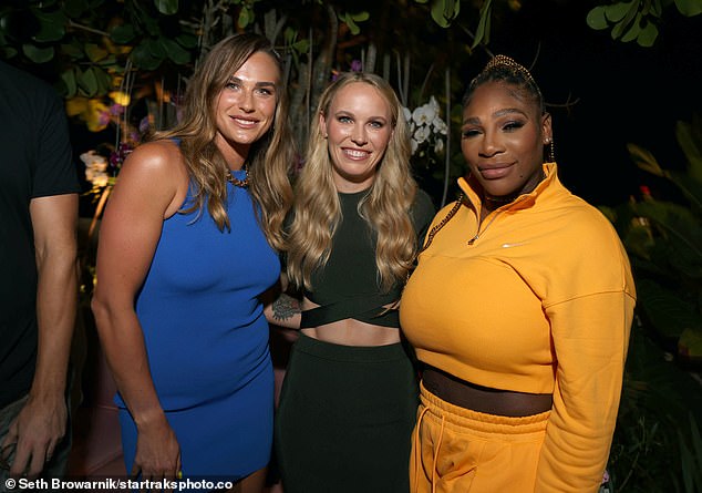 Smile: The tennis star was seen posing for a photo with LR Arina Sabalenko and Caroline Wozniacki