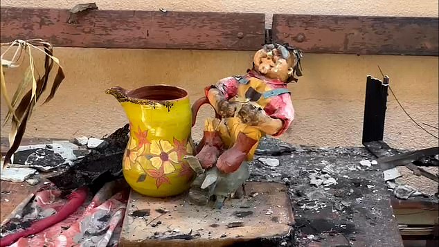 Hamas terrorists set fire to houses.  One of the slaughtered victims was a pregnant woman whose stomach was cut open, it was claimed (photo of damage in one house)