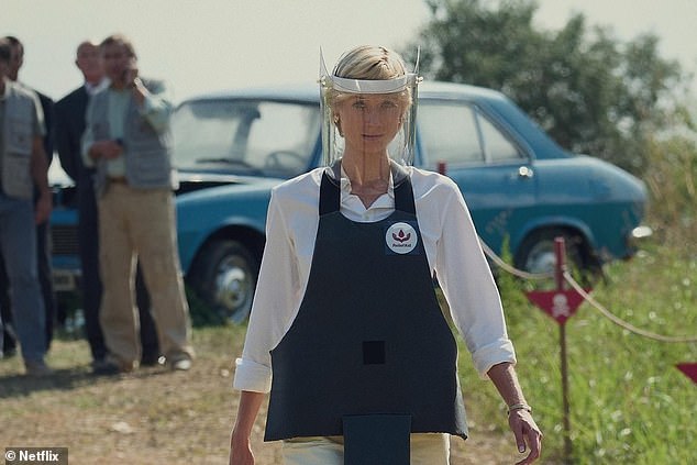 Elizabeth Debicki is seen wearing an exact replica of Diana's outfit (pictured), meticulously mimicking her chunky gold earrings, blown-out hairdo and white shirt