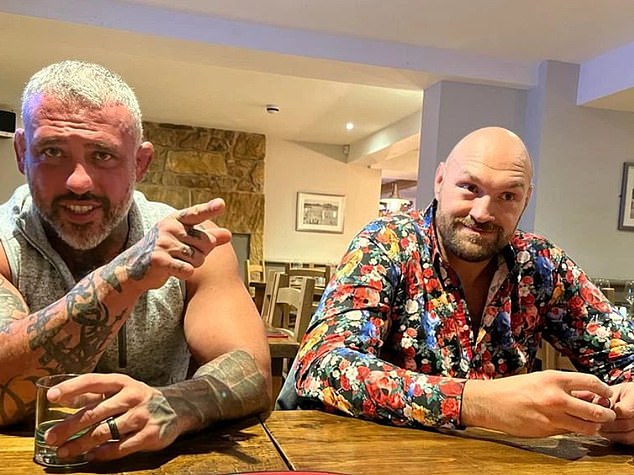 Fury (right) has his nutritionist George Lockhart (left) live with him throughout the fight camp