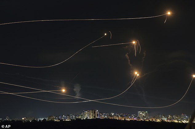 Israel's Iron Dome air defense system fires to intercept a rocket fired from the Gaza Strip, in Ashkelon, Israel, Friday, October 20, 2023