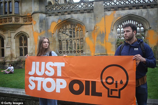 Plot: The group have organized a stage stunt to take place at some point this autumn as part of a campaign to 'amplify' the climate group's activism (pictured at a protest outside King's College, Cambridge earlier this month)