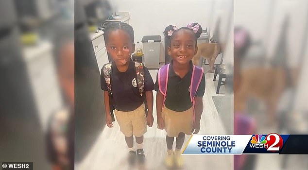 Officers found a gun on the floor of Hutto's home — where the twins were found — but investigators found no obvious signs of trauma to their bodies