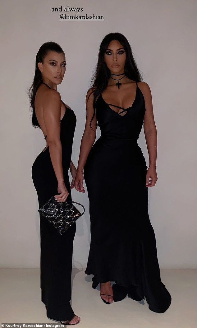 Little black dress: The Keeping Up With The Kardashians star shared several throwback photos with Kim on her Instagram Stories for her 224 million followers, including one of the siblings dressed to the nines in elegant black dresses