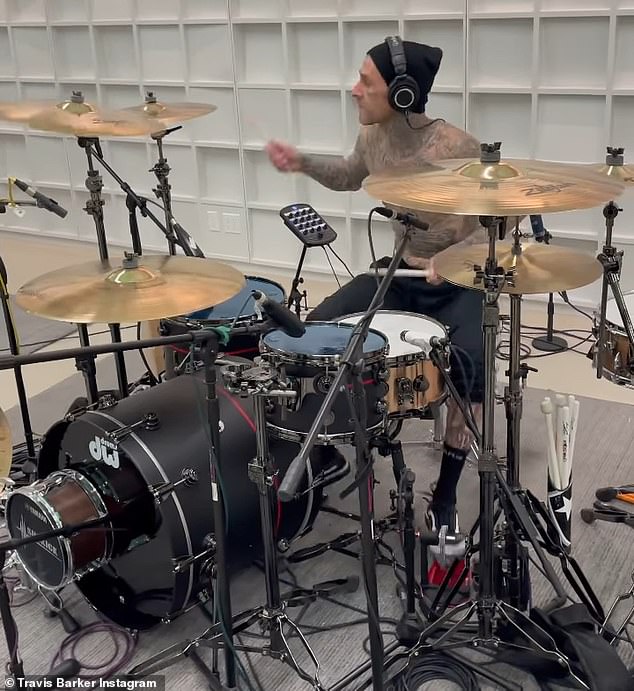 Obsessed: The pregnant reality star, 44, gushed about her rock star boyfriend while commenting on an Instagram video of the Blink-182 drummer recording a new album on Friday