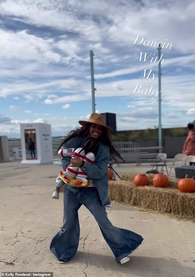 Bustin' the moves: At one point, Rowland decided to dance with the youngest of her two boys, Noah, two, and she captured it all on camera for her Instagram Stories