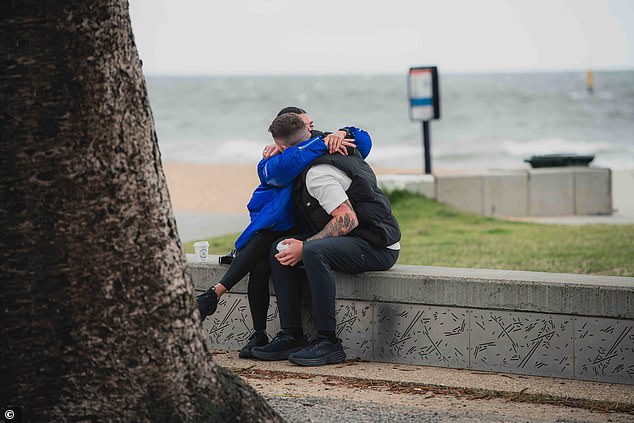 It appeared the 28-year-old was the one who popped the question and presented her husband with a ring during a romantic walk on the beach next to Elwood Bathers in Victoria.