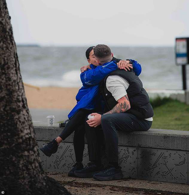 Guy appeared to have said yes as he hugged and kissed his new fiancée immediately afterwards