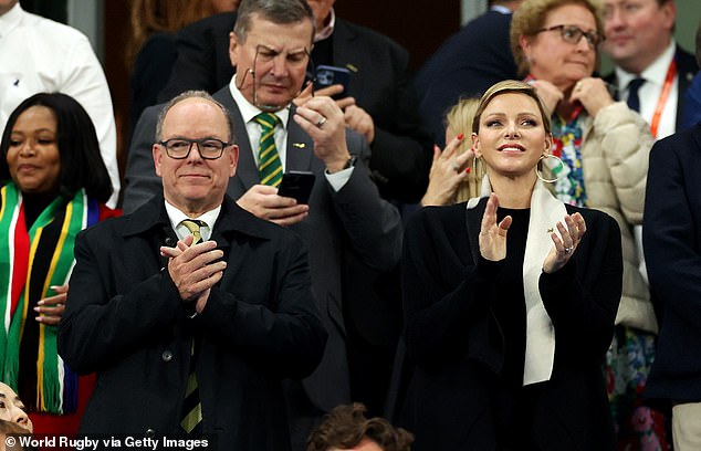 The couple were photographed laughing and clapping as South Africa defeated England in the semi-final