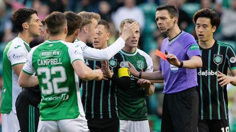 EDINBURGH, SCOTLAND - MAY 24: Referee Kevin Clancy shows Hibernian's Jake Doyle-Hayes a red card before it is withdrawn following a VAR check during a snap Premiership match between Hibernian and Celtic at Easter Road, on May 24, 2023, in Edinburgh, Scotland.  (Photo by Ewan Bootman / SNS Group)