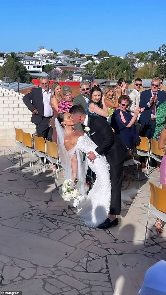 The footy star took his new bride for a dip after they became husband and wife