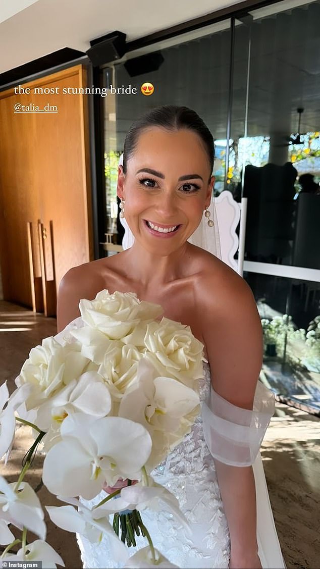 She had a bunch of white orchids for her bouquet