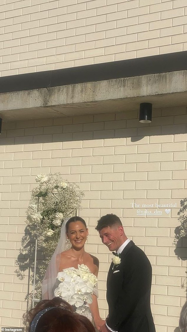 The couple exchanged vows during an outdoor ceremony on the roof