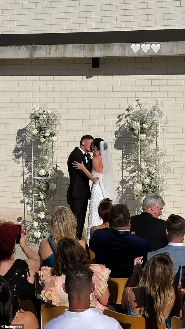 Dayne romantically kissed his beautiful bride after saying 