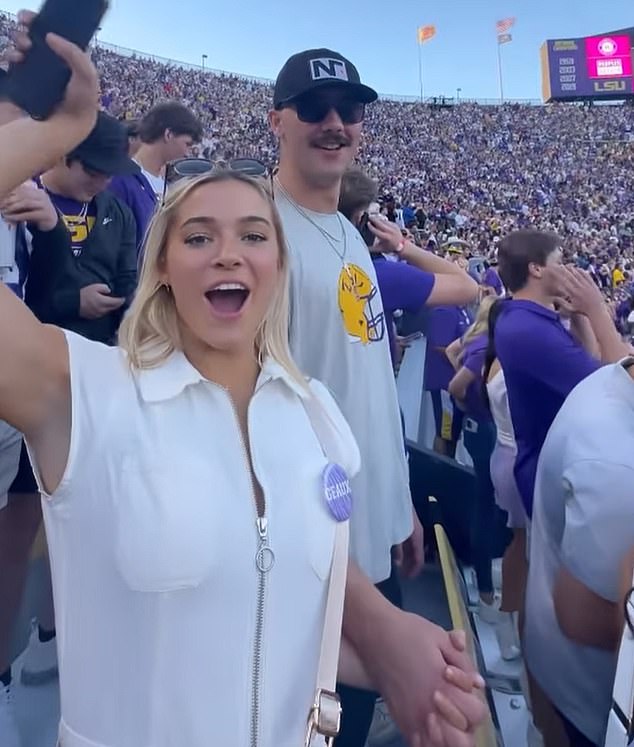 She held hands with MLB pitcher friend Paul Skenes as they watched the Tigers last week