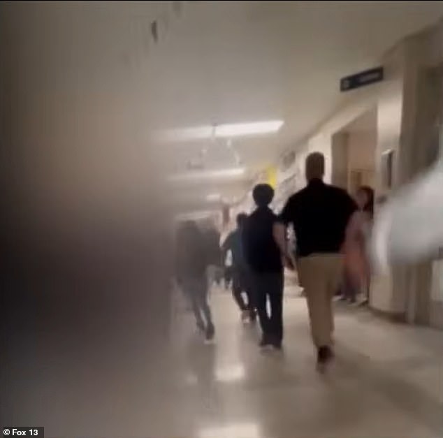 Teachers and administrators managed to chase the masked individuals off campus after they ran through the halls on Monday.  The school reported that they were only in the school for less than 40 seconds, but during that time they managed to hit and push students