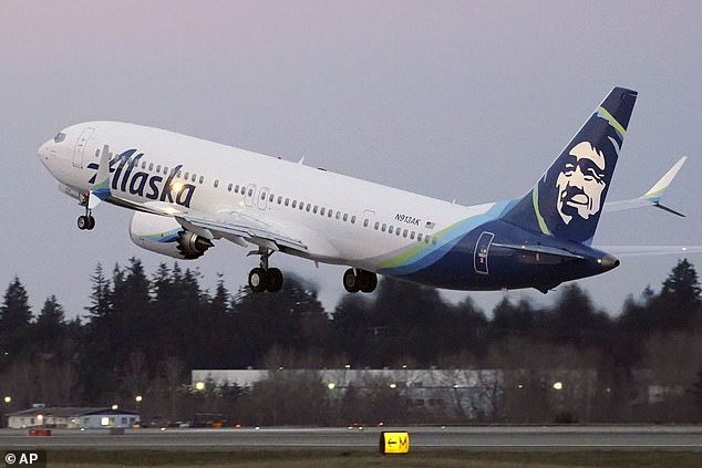 The Alaska Airlines flight from Orange County, California, aborted the landing after the second plane took off from a parallel runway in the north.  (Pictured: A 2021 Alaska Airlines passenger flight)