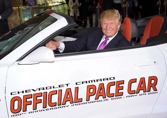 Donald Trump (pictured here at the 2011 Indianapolis 500) has campaigned for the support of UAW union workers whose jobs may be at risk from the EV push