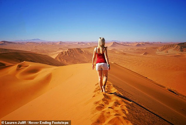 While traveling, Lauren met her partner, a fellow digital nomad, and they began traveling the world together.  Here she is seen crossing the dunes of Sossusvlei, Namibia