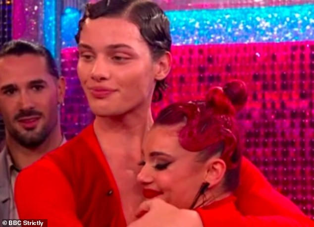 Difficult: The professional dancer, 34, struggled to contain her emotions while holding back tears while talking to Claudia Winkleman after their routine last week