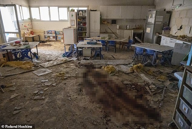 In Kibbutz Be'eri, people slept while the militants peered into people's dark living rooms.  They played with outdoor decorations and used a cigarette lighter to set fire to a dream catcher hanging from someone's window.  More than 120 bodies were found there (photo: Be'eri's kindergarten)