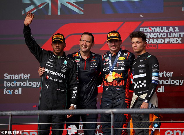 Hamilton (left) and Lando Norris (right) took the remaining podium places after a good race